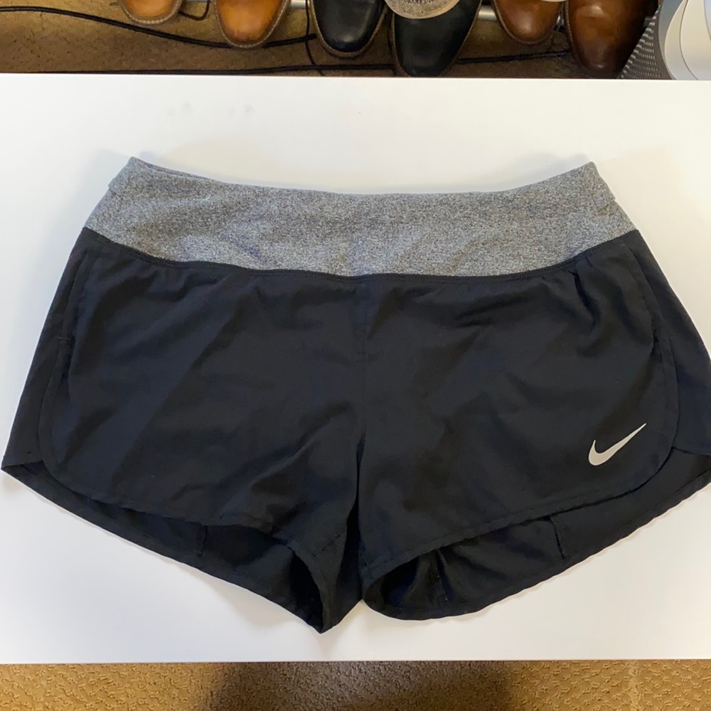 Black Nike running shorts